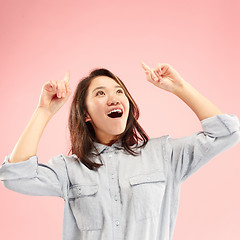 Image showing Winning success woman happy ecstatic celebrating being a winner. Dynamic energetic image of female model