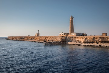 Image showing Tall lighthouse on the sea