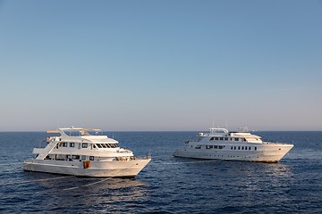 Image showing Luxury yacht docking near coral reef