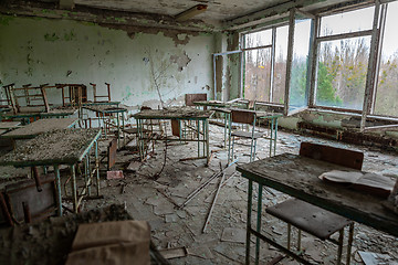 Image showing Messy and abandoned classroom in ghost town