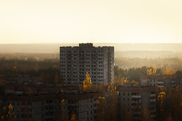 Image showing Large abandoned old apartment in the sunset