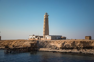 Image showing Tall lighthouse on the sea