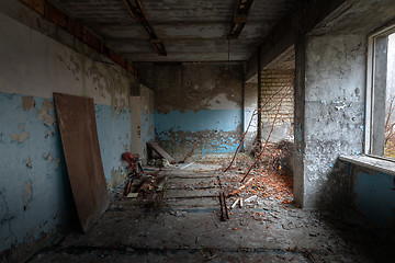 Image showing Abandoned and messy room in ghost town