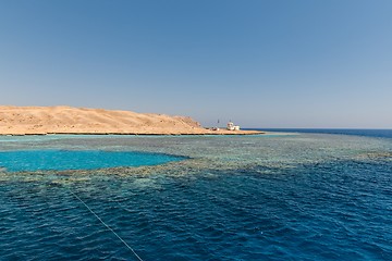 Image showing Small island with coral reef