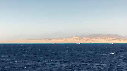 Image showing Land over the horizon with mountains