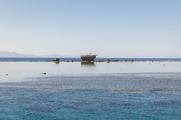 Image showing Seascape with junk ship on the horizon