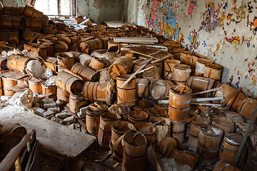 Image showing Old and damaged wine and beer barrels