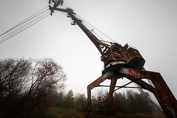 Image showing Rusty old industrial dock cranes at the Dock