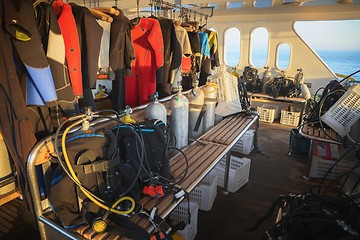 Image showing Scuba gear on the boat drying