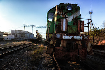 Image showing Abandoned train left outside at train station