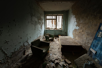 Image showing Abandoned room in damaged building