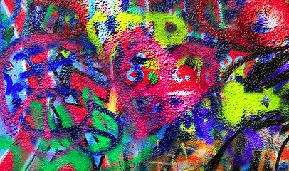 Image showing Detail of bright colorful John Lennon's wall with graffiti in Pr