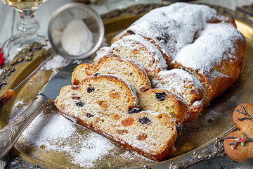 Image showing Slices of traditional Christmas Stollen close-up.