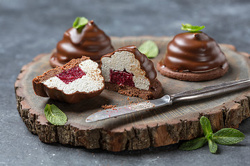 Image showing Marshmallow cakes with chocolate icing.