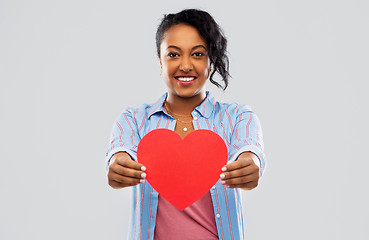 Image showing happy african american woman with red heart