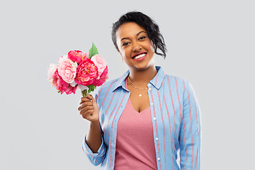 Image showing happy african american woman with bunch of flowers