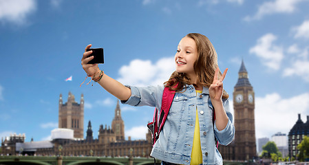 Image showing teenage student girl taking selfie by smartphone