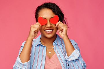 Image showing happy african american woman with eyes of hearts