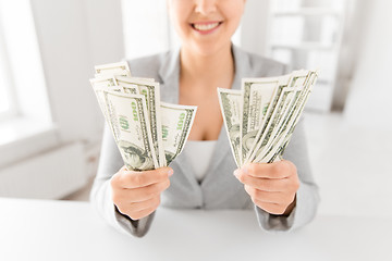 Image showing close up of woman hands holding us dollar money