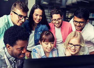 Image showing international students with computers at library