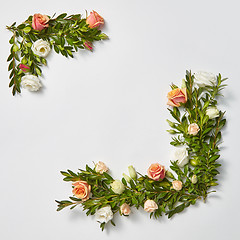 Image showing Square greeting card with evergreen twigs and flowers.