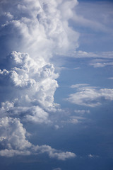 Image showing Vertical clouds background with blue sky.