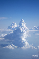 Image showing Shape of big fluffy clouds on a blue sky background.