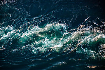 Image showing Waves of water of the river and the sea meet each