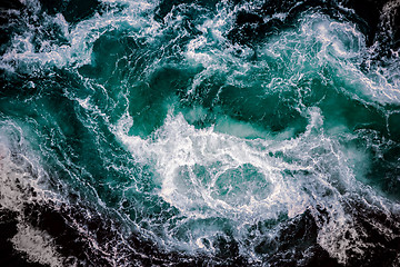 Image showing Waves of water of the river and the sea meet each