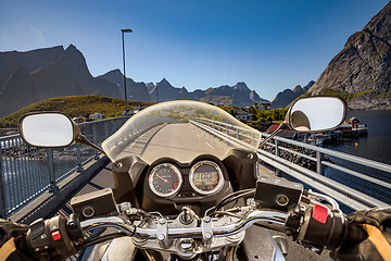 Image showing Biker rides on road in Norway. First-person view.