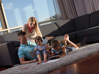 Image showing young happy couple spending time with kids