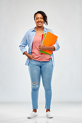 Image showing african american student woman with notebooks