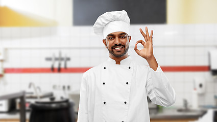 Image showing indian chef showing ok sign at restaurant kitchen