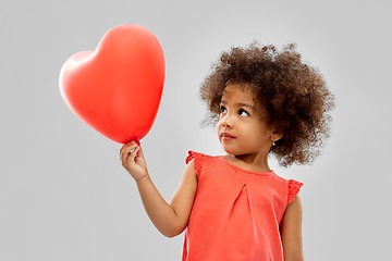 Image showing african american girl with heart shaped balloon