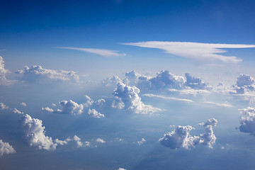 Image showing Bright white clouds in a blue clear sky.