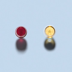 Image showing Two glasses of red and white wine. Top view.