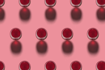 Image showing Red wine glasses pattern with shadows. Top view.