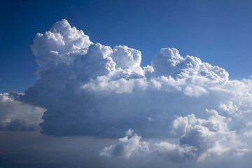 Image showing Huge white clousd on a background of blue sky.