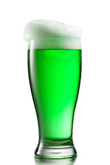 Image showing Fresh natural light beer with thick foam in a glass.