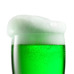 Image showing Macro view of extra foam on top of green beer drink.