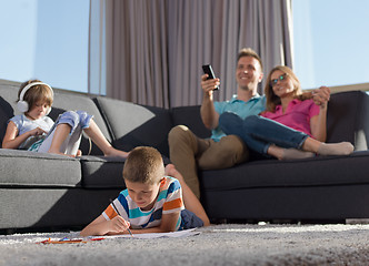 Image showing young happy couple spending time with kids