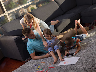 Image showing young happy couple spending time with kids