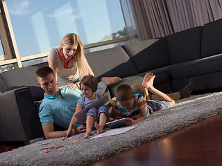 Image showing young happy couple spending time with kids