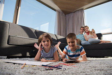 Image showing young couple spending time with kids