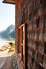 Image showing Beautiful view of traditional wooden boat house at the shores of famous Lake Obersee in scenic Nationalpark Berchtesgadener Land