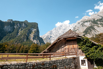 Image showing Beautiful view of traditional wooden boat house at the shores of famous Lake Obersee in scenic Nationalpark Berchtesgadener Land