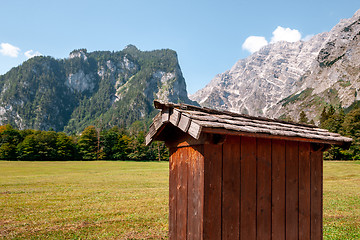 Image showing Beautiful view of traditional wooden boat house at the shores of famous Lake Obersee in scenic Nationalpark Berchtesgadener Land