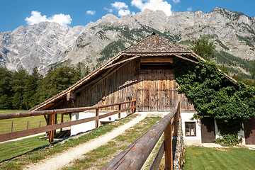 Image showing Beautiful view of traditional wooden boat house at the shores of famous Lake Obersee in scenic Nationalpark Berchtesgadener Land