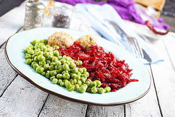 Image showing cutlets with peas