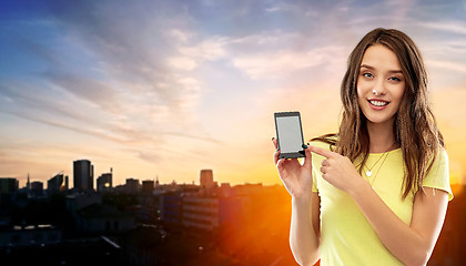 Image showing young woman or teenage girl holding smartphone